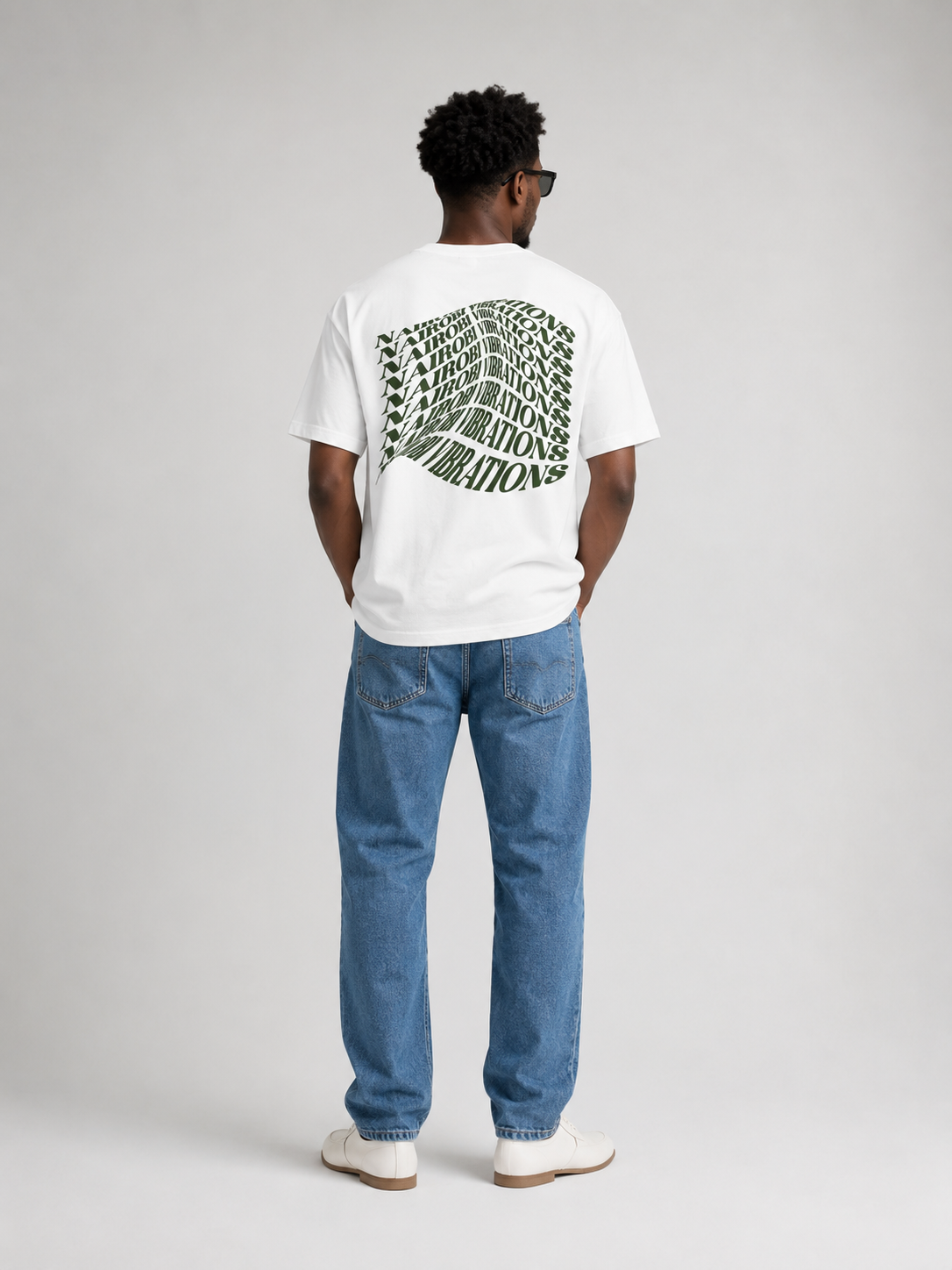 Nairobi Vibrations White T-Shirt With Green Ink