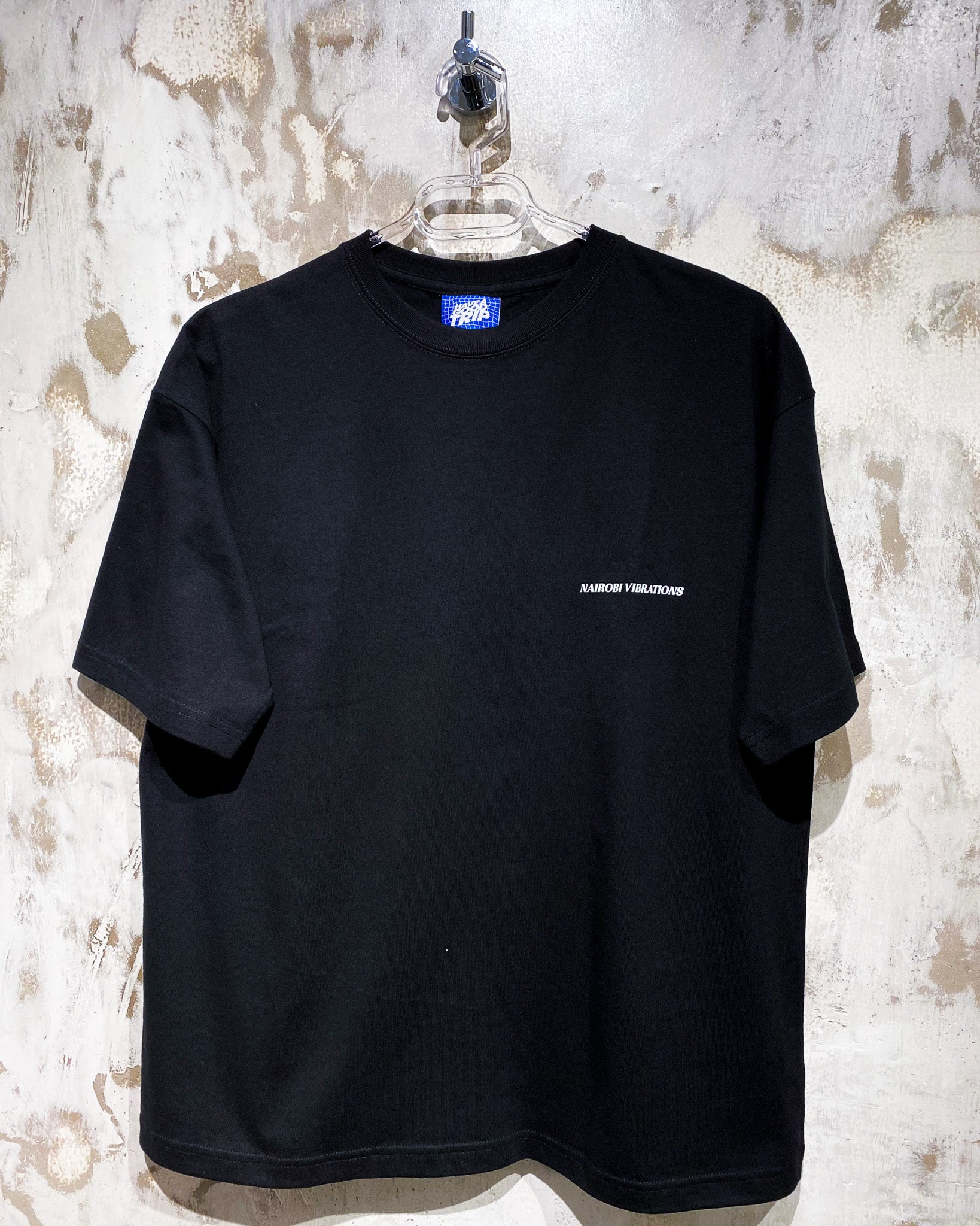 Nairobi Vibrations Black T-Shirt with White Ink