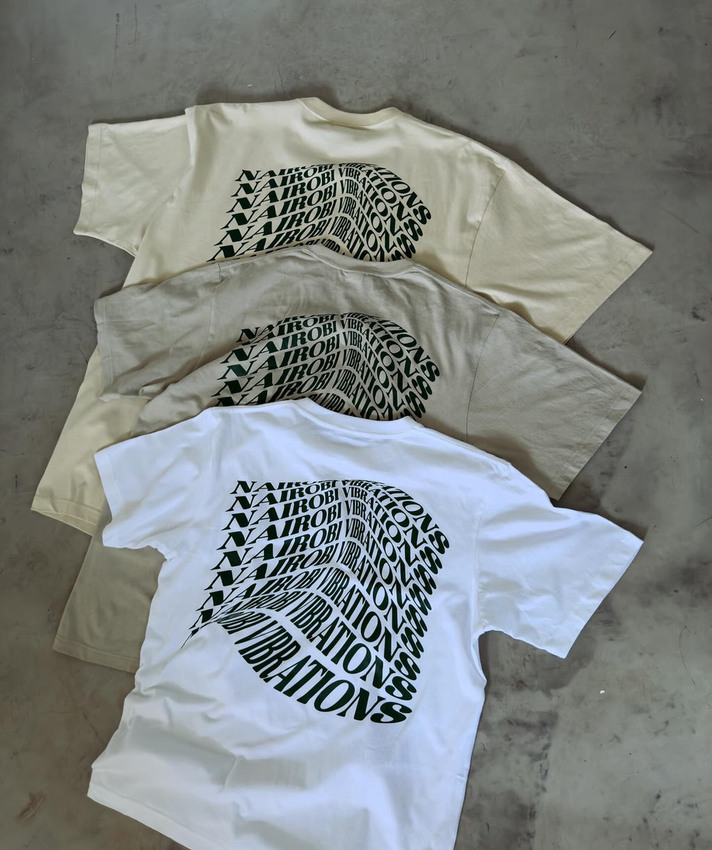 Nairobi Vibrations Beige T-Shirt With Green Ink