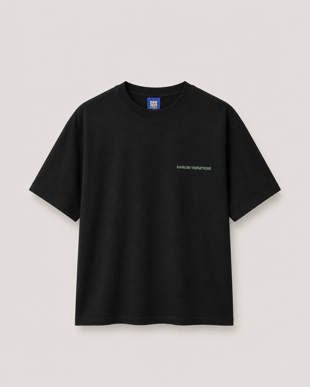 Nairobi Vibrations Black T-Shirt with Green Ink