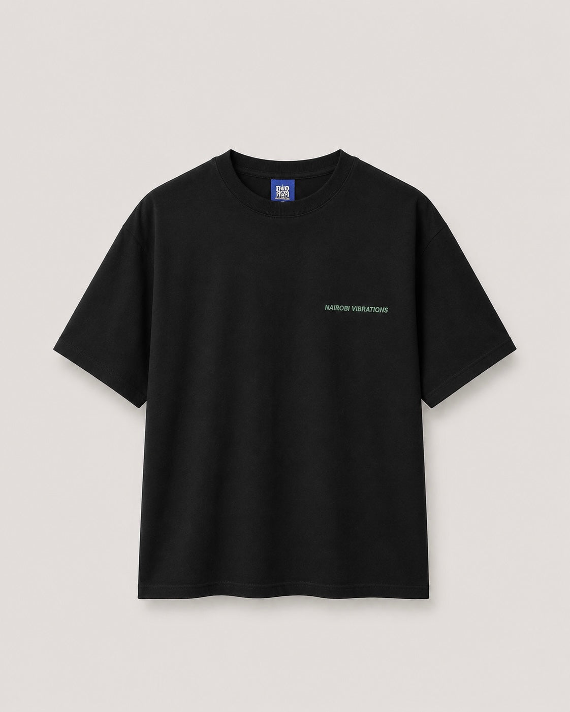 Nairobi Vibrations Black T-Shirt with Green Ink