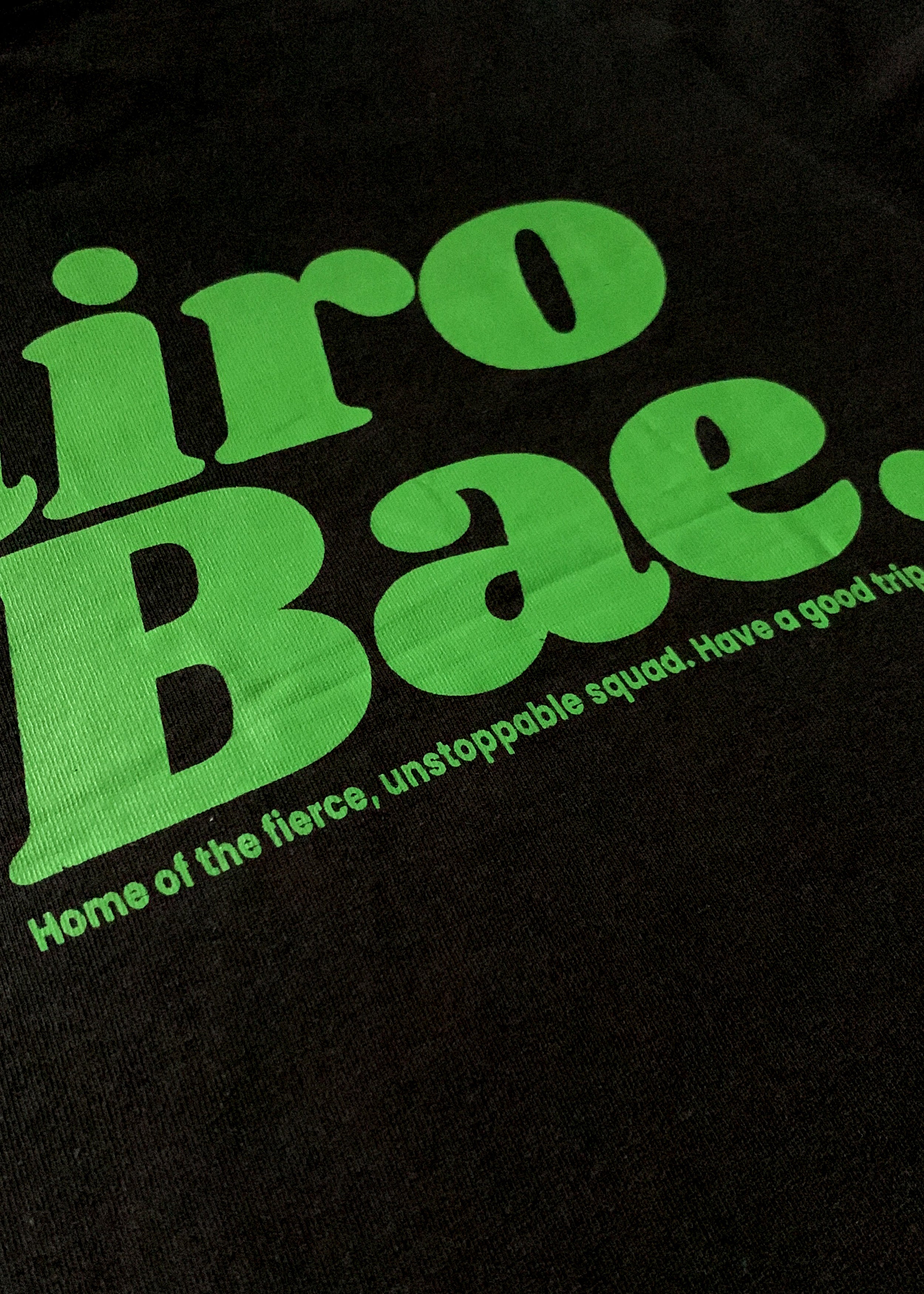 NairoBae Black T-Shirt with Green ink.