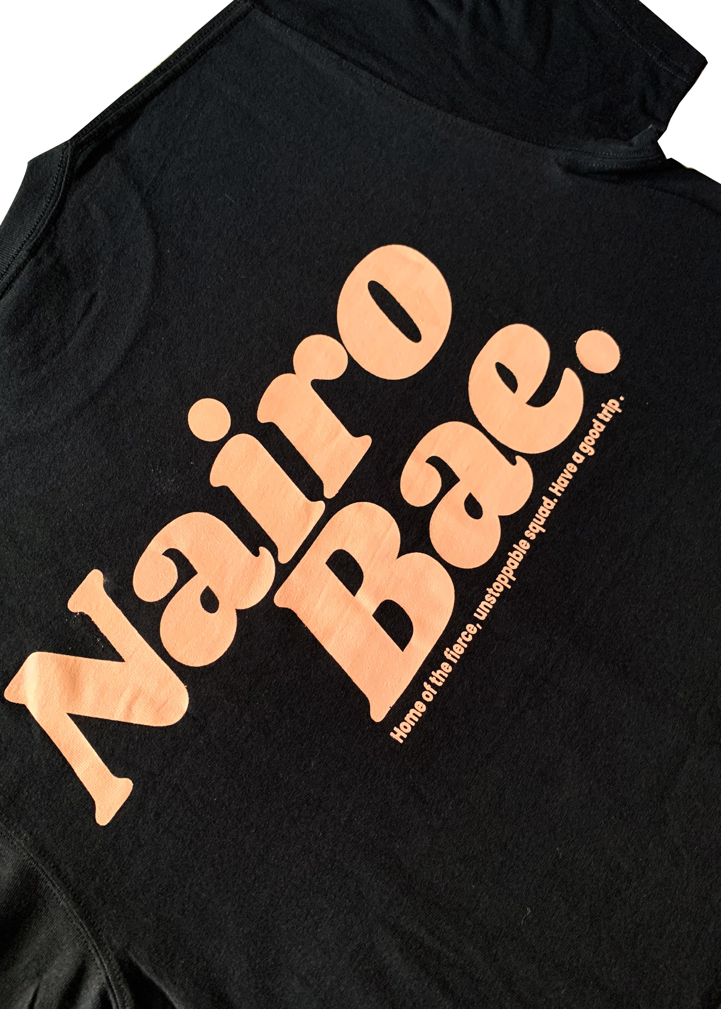 Nairobae Black T-Shirt with Peach Ink