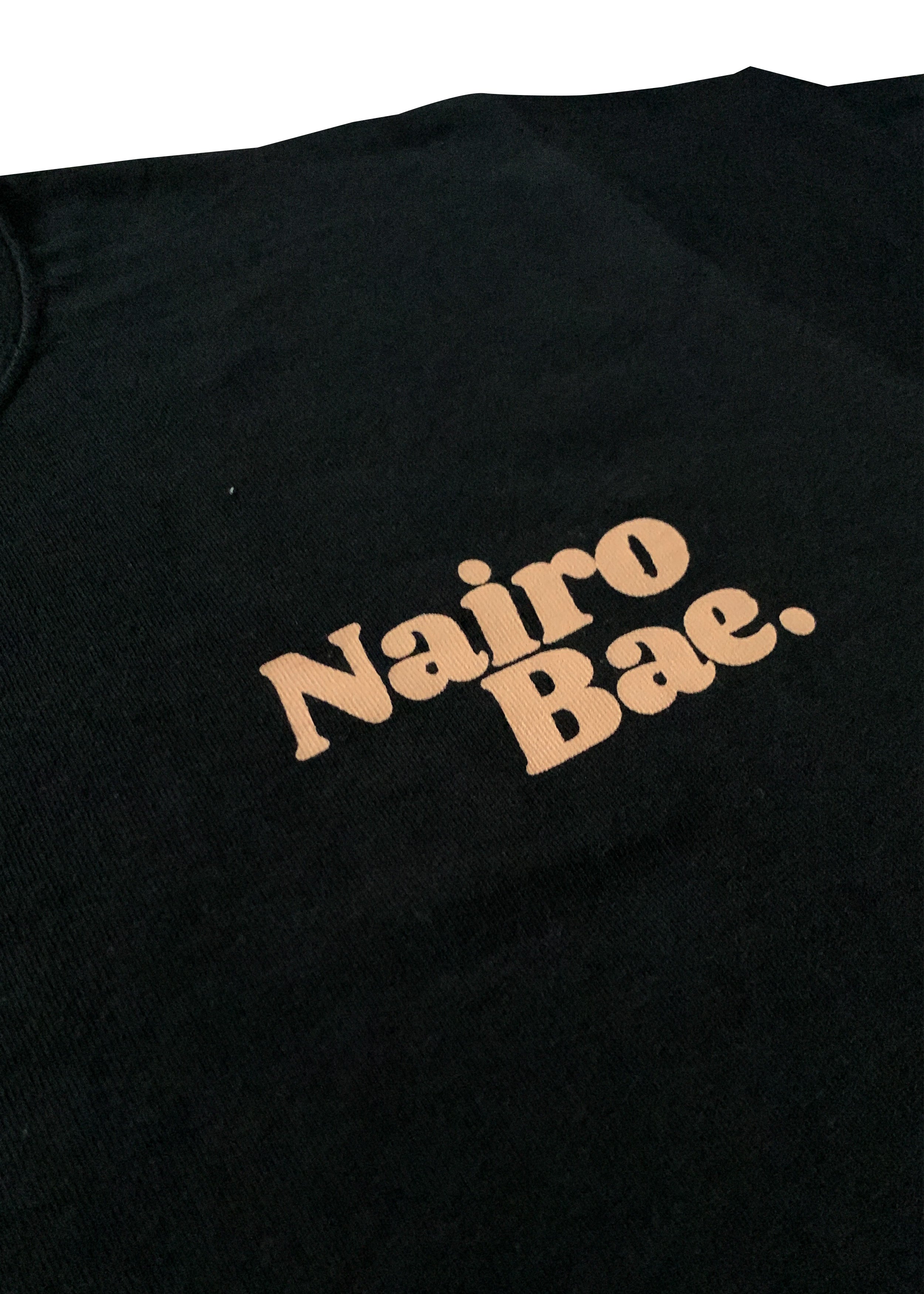 Nairobae Black T-Shirt with Peach Ink