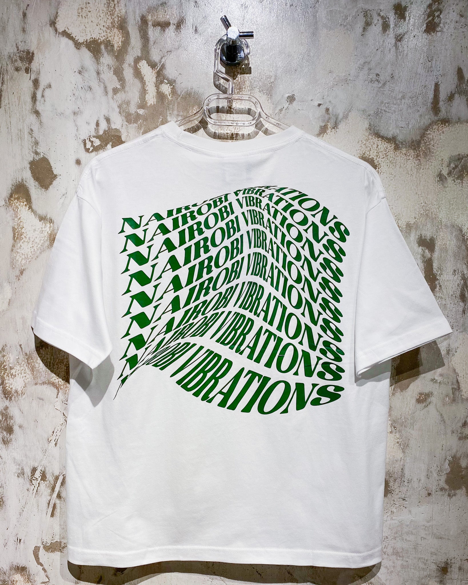 Nairobi Vibrations White T-Shirt With Green Ink